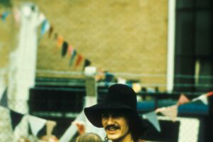 Man with a megaphone, Tolmers carnival, 1974