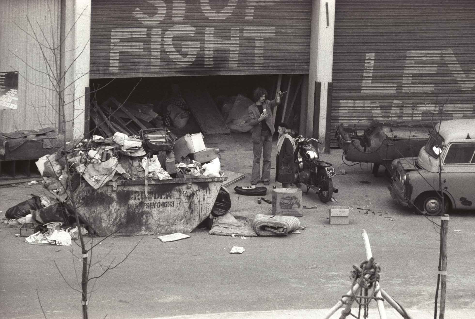 Passing the time of day, Tolmers Square, 1976