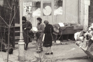 Feeding feral cats in Tolmers Square, 1976