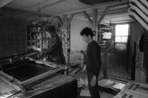 Poster workshop run by a group of radical artists in a squat on the south side of Tolmers Square, 1976