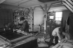 Poster workshop run by a group of radical artists in a squat on the south side of Tolmers Square, 1976